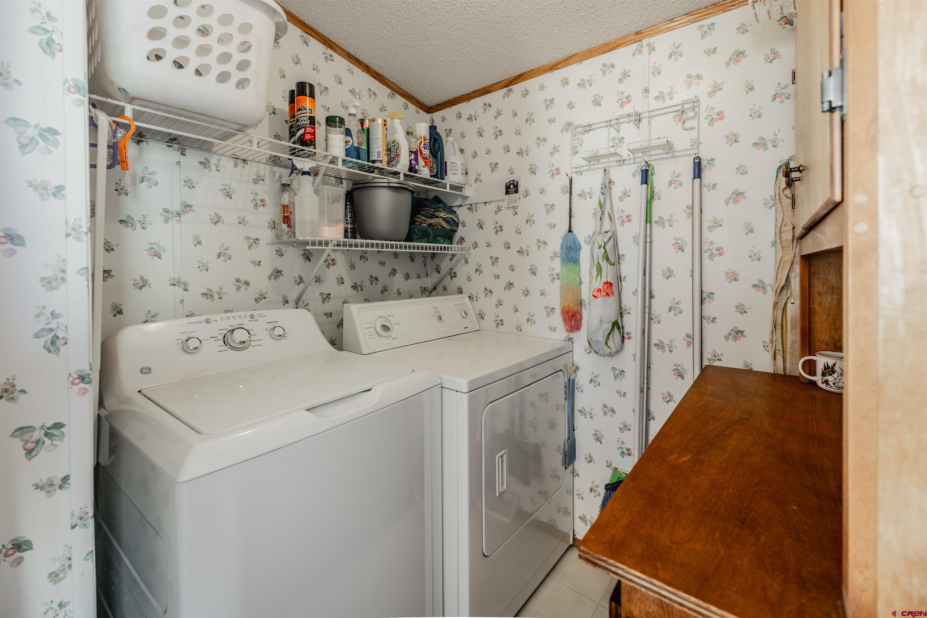 9713 Kebler Road, Unit 28 Austin, CO 81410 - Photo 8 of 25 a utility room with dryer and washer