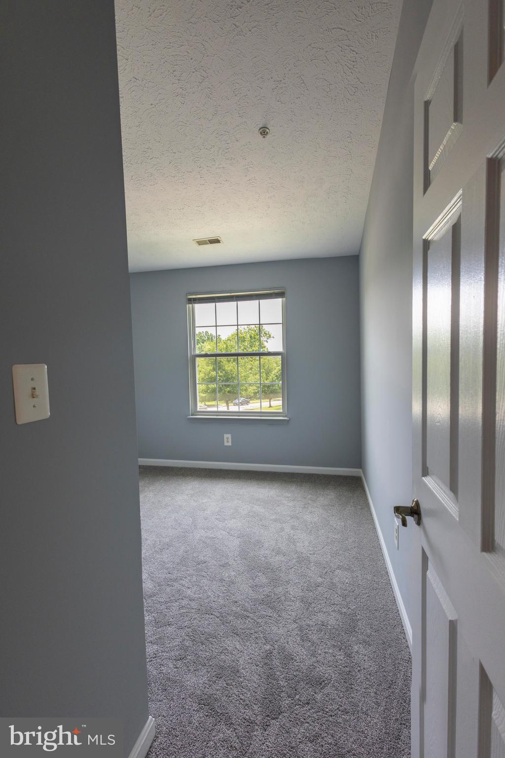 502 Buckstone Garth Abingdon, MD 21009 - Photo 13 of 36 an empty room with windows