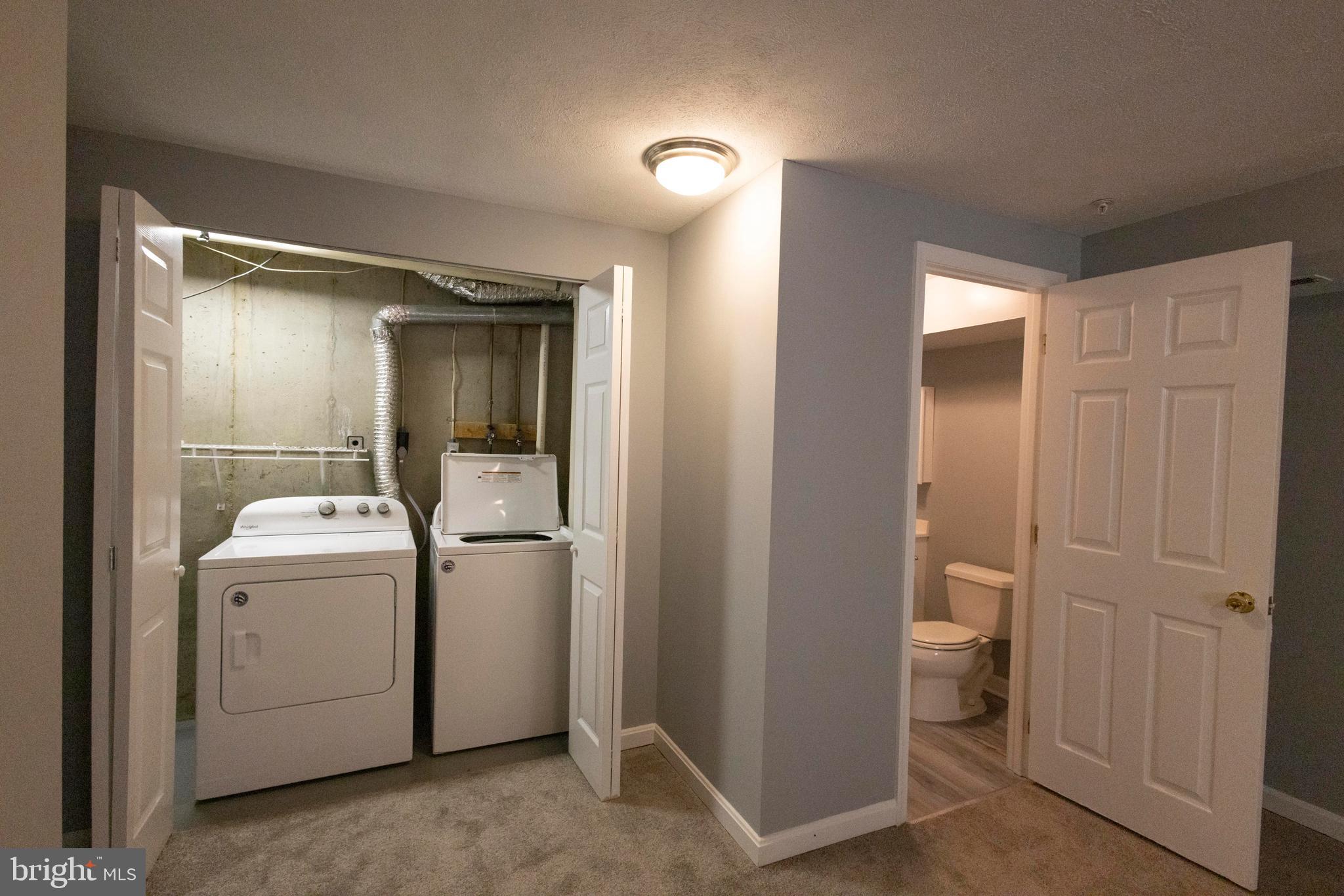 502 Buckstone Garth Abingdon, MD 21009 - Photo 20 of 36 a view of utility room with washer and dryer