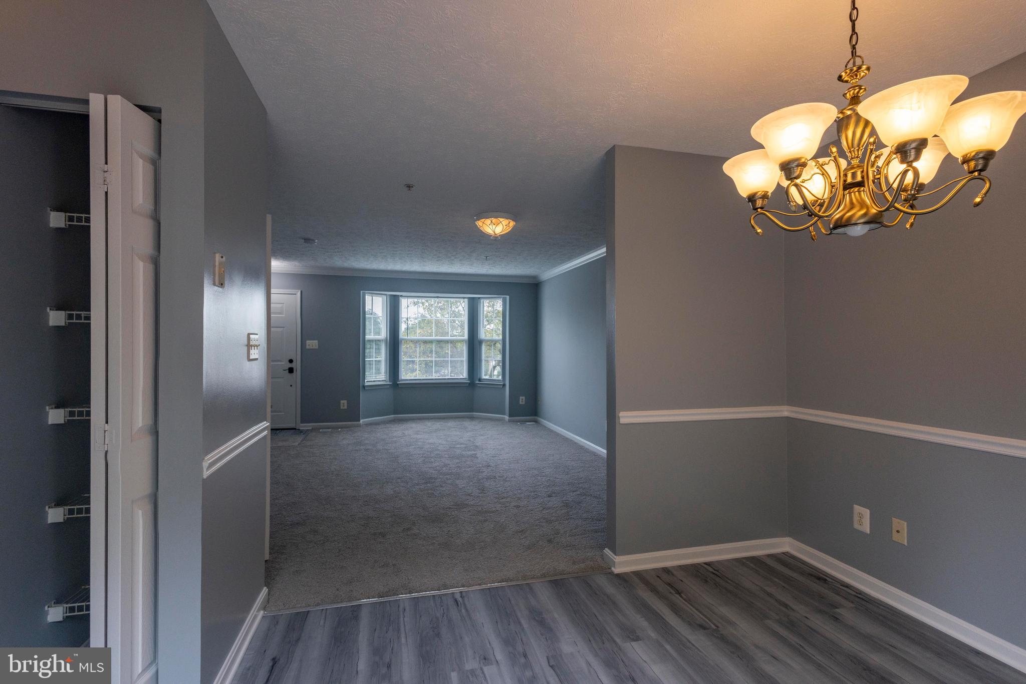502 Buckstone Garth Abingdon, MD 21009 - Photo 33 of 36 a view of an empty room with wooden floor and a window