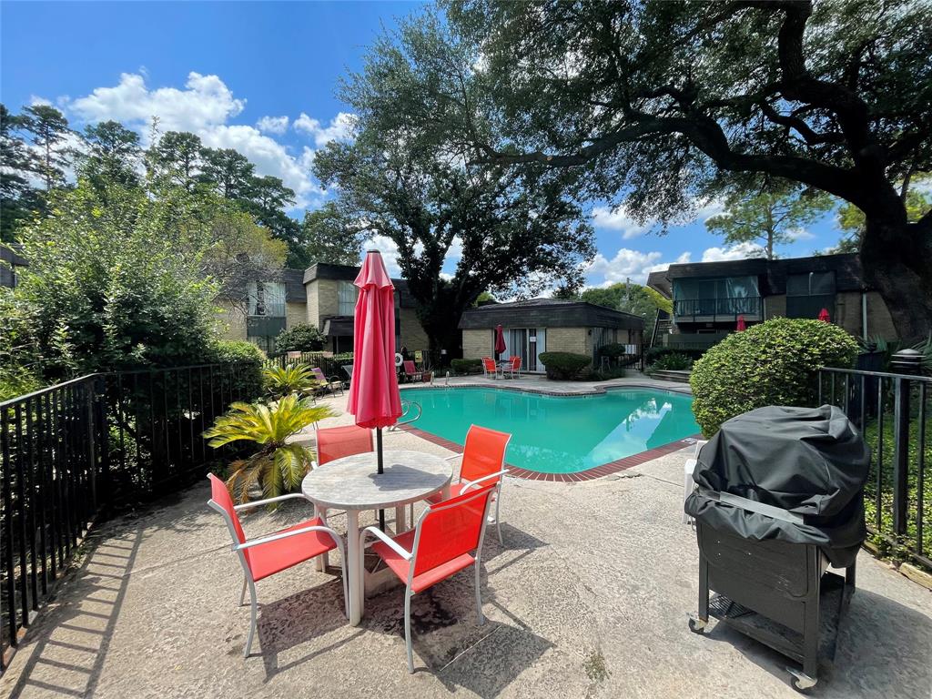 7000 Creswell Road, Unit 117 Shreveport, LA 71106 - Photo 1 of 1 an outdoor sitting area with furniture and garden