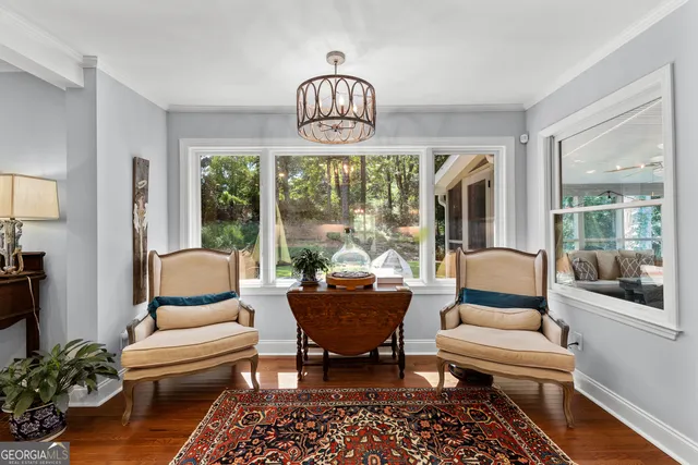 a bathroom with a bathtub and a window