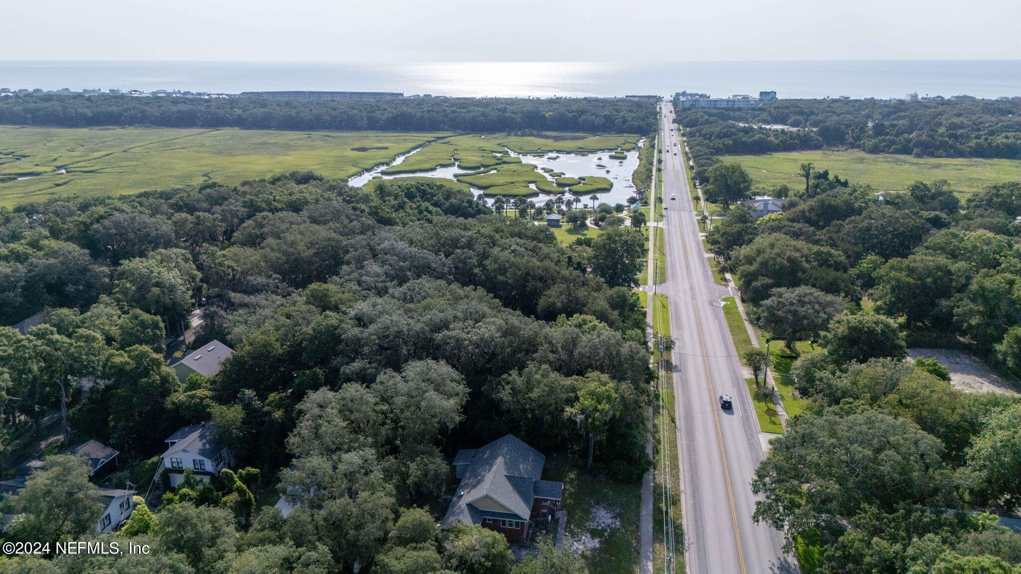 0 Atlantic Avenue Fernandina Beach, FL 32034 - Photo 21 of 37 an aerial view of a house with a garden and lake view
