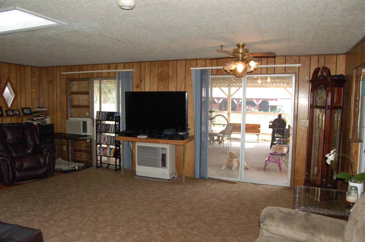 2180 Dick George Road Cave Junction, OR 97523 - Photo 20 of 34 Living room looking towards the large co