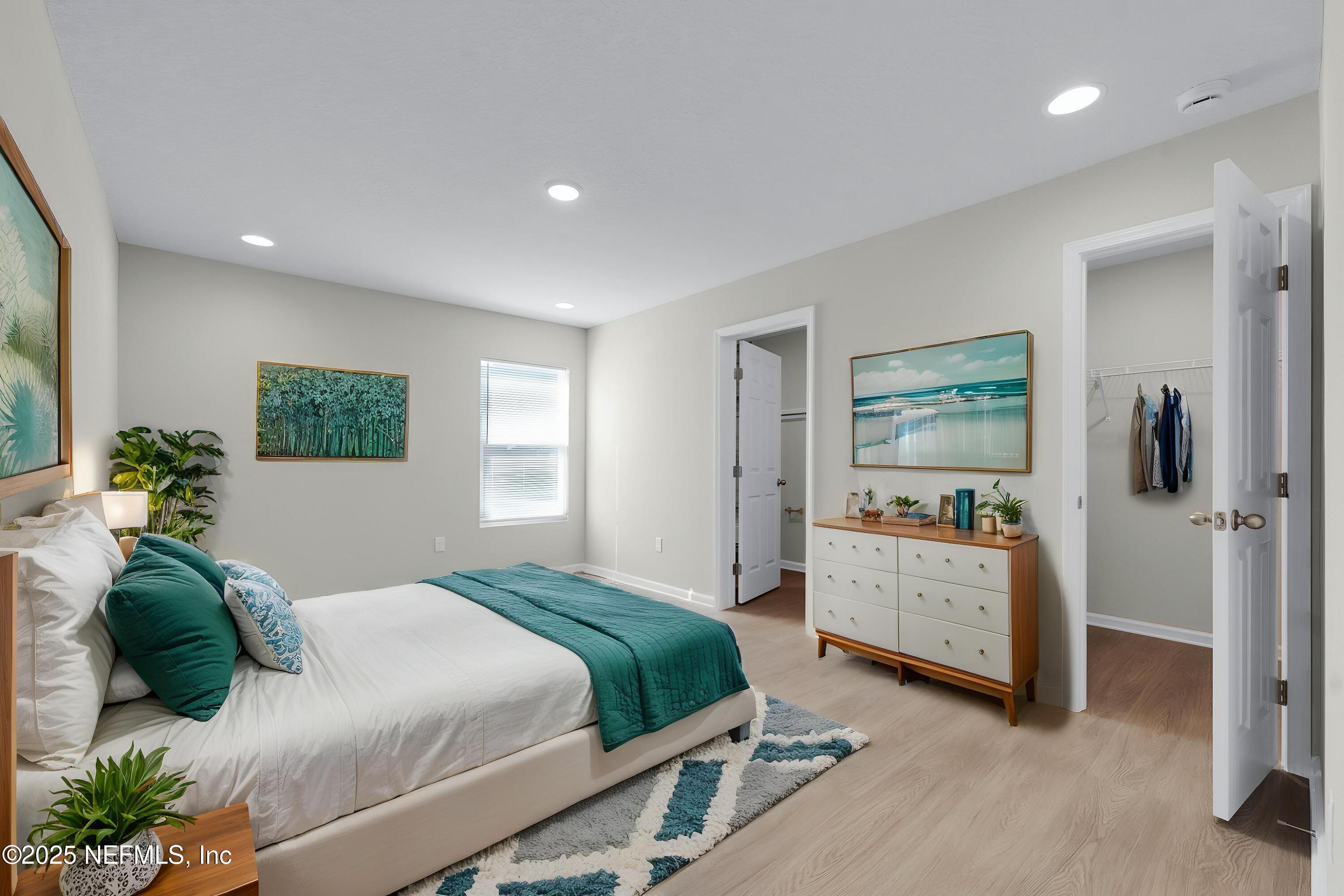 5211 Vernon Road Jacksonville, FL 32209 - Photo 14 of 27 a bedroom with a bed and a window