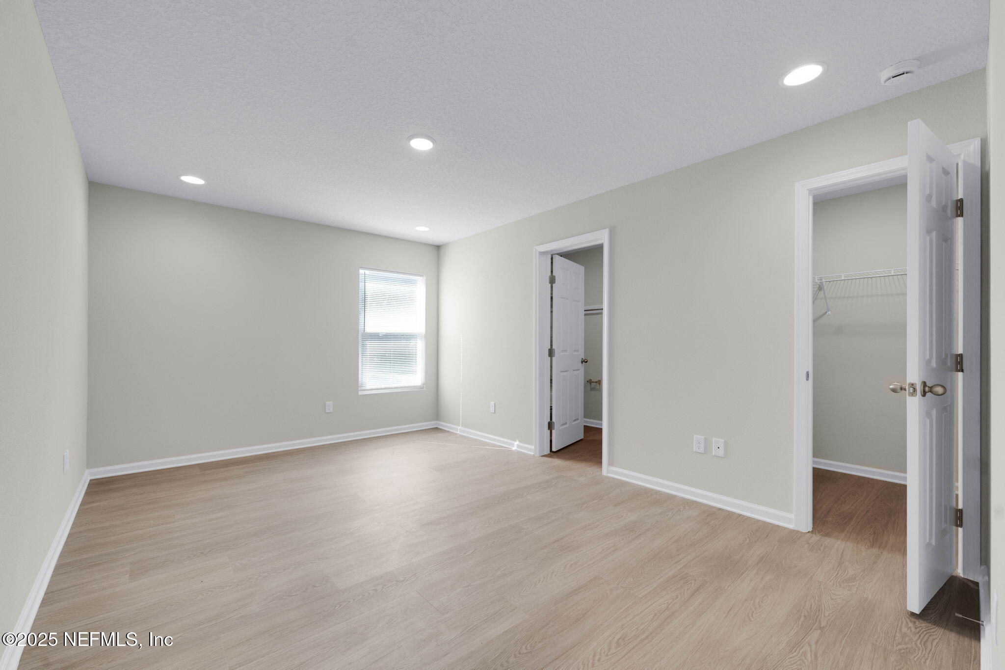 5211 Vernon Road Jacksonville, FL 32209 - Photo 15 of 27 wooden floor in an empty room with a window