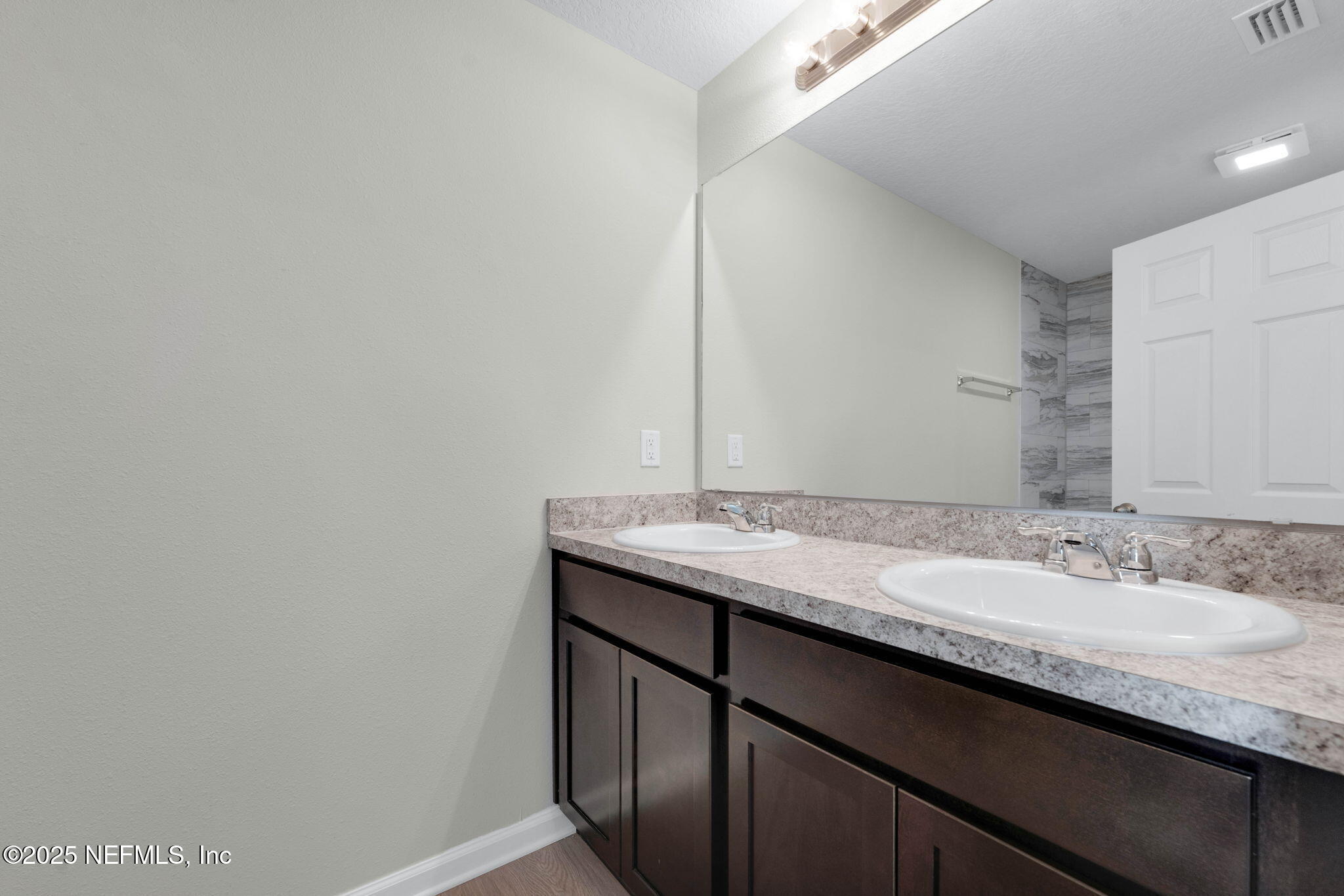 5211 Vernon Road Jacksonville, FL 32209 - Photo 17 of 27 a bathroom with a granite countertop sink and a mirror