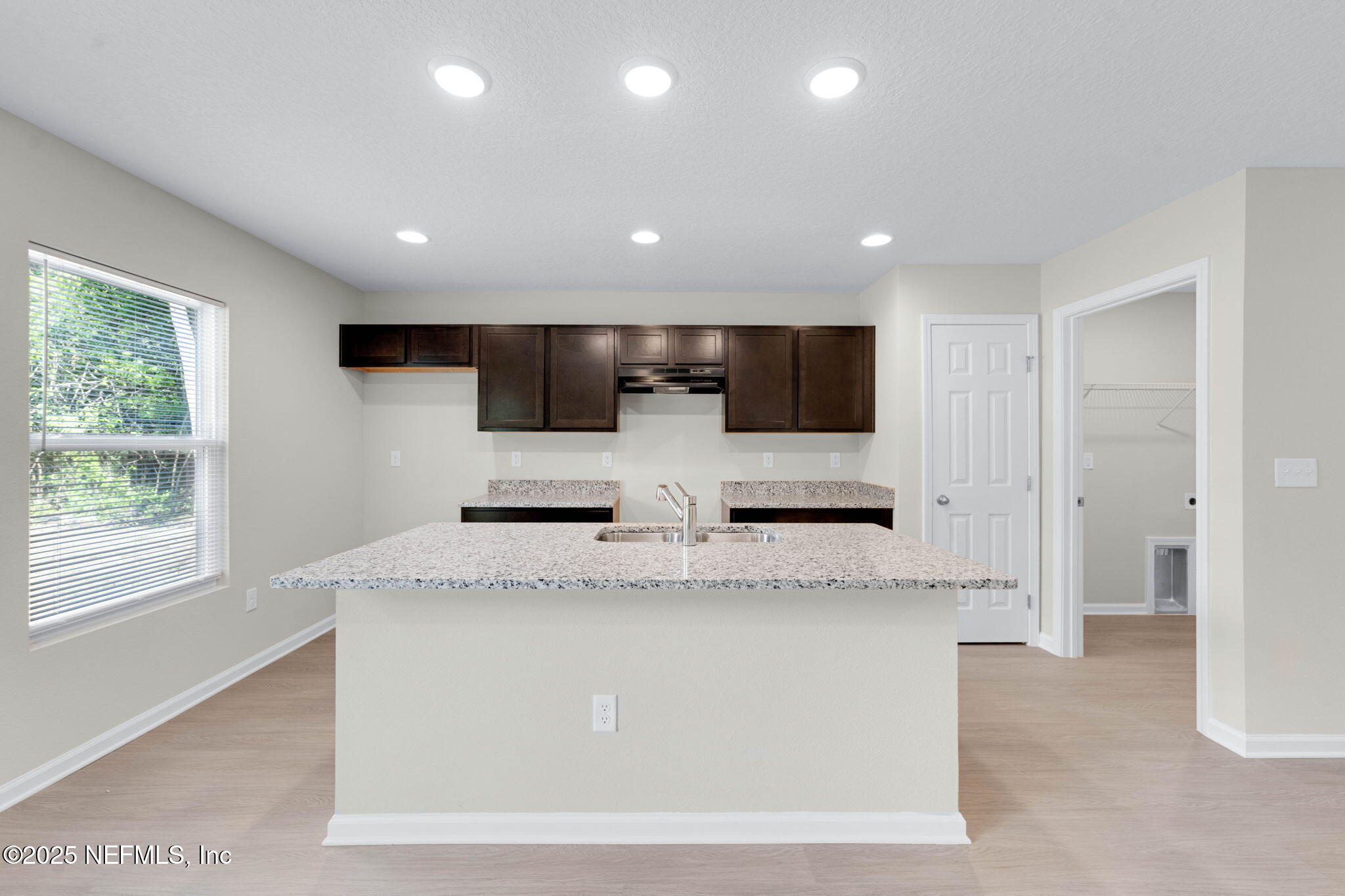 5211 Vernon Road Jacksonville, FL 32209 - Photo 9 of 27 a large white kitchen with a large window