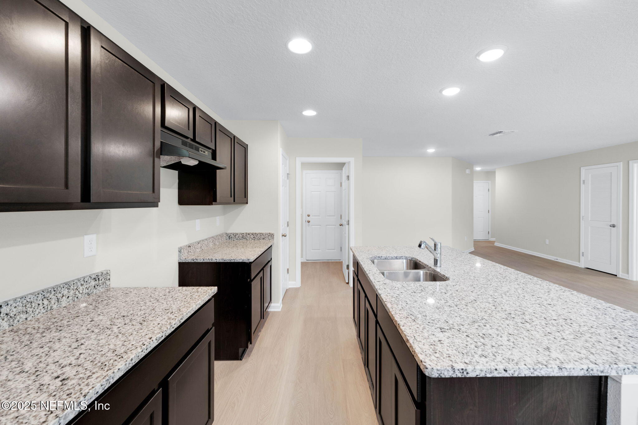 5211 Vernon Road Jacksonville, FL 32209 - Photo 10 of 27 a kitchen with stainless steel appliances granite countertop counter space a sink and stove