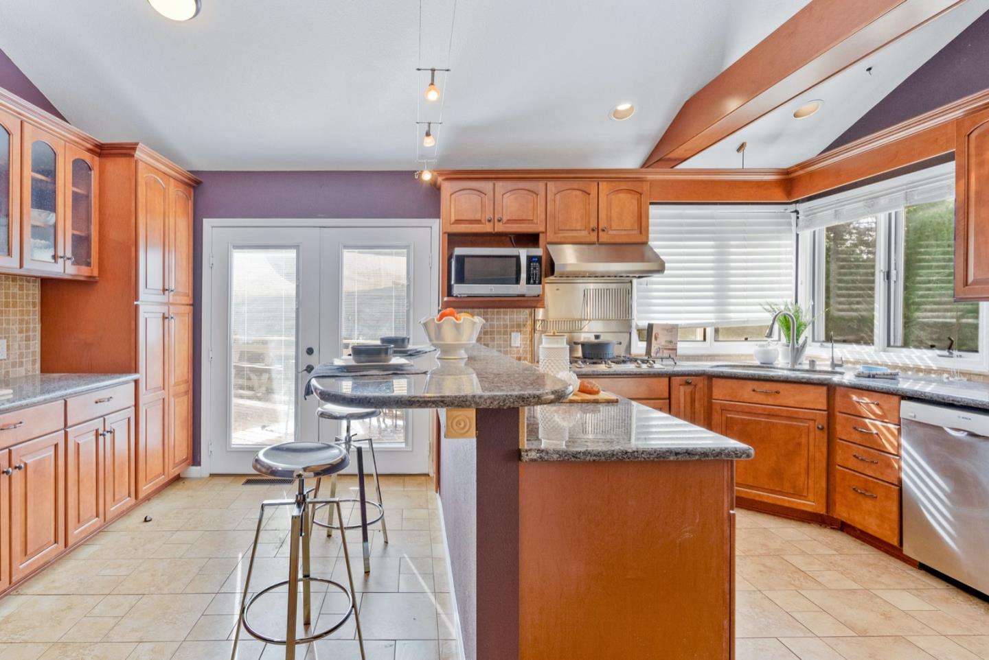 720 Fern Ridge Felton, CA 95018 - Photo 15 of 47 a kitchen with stainless steel appliances granite countertop a sink and cabinets