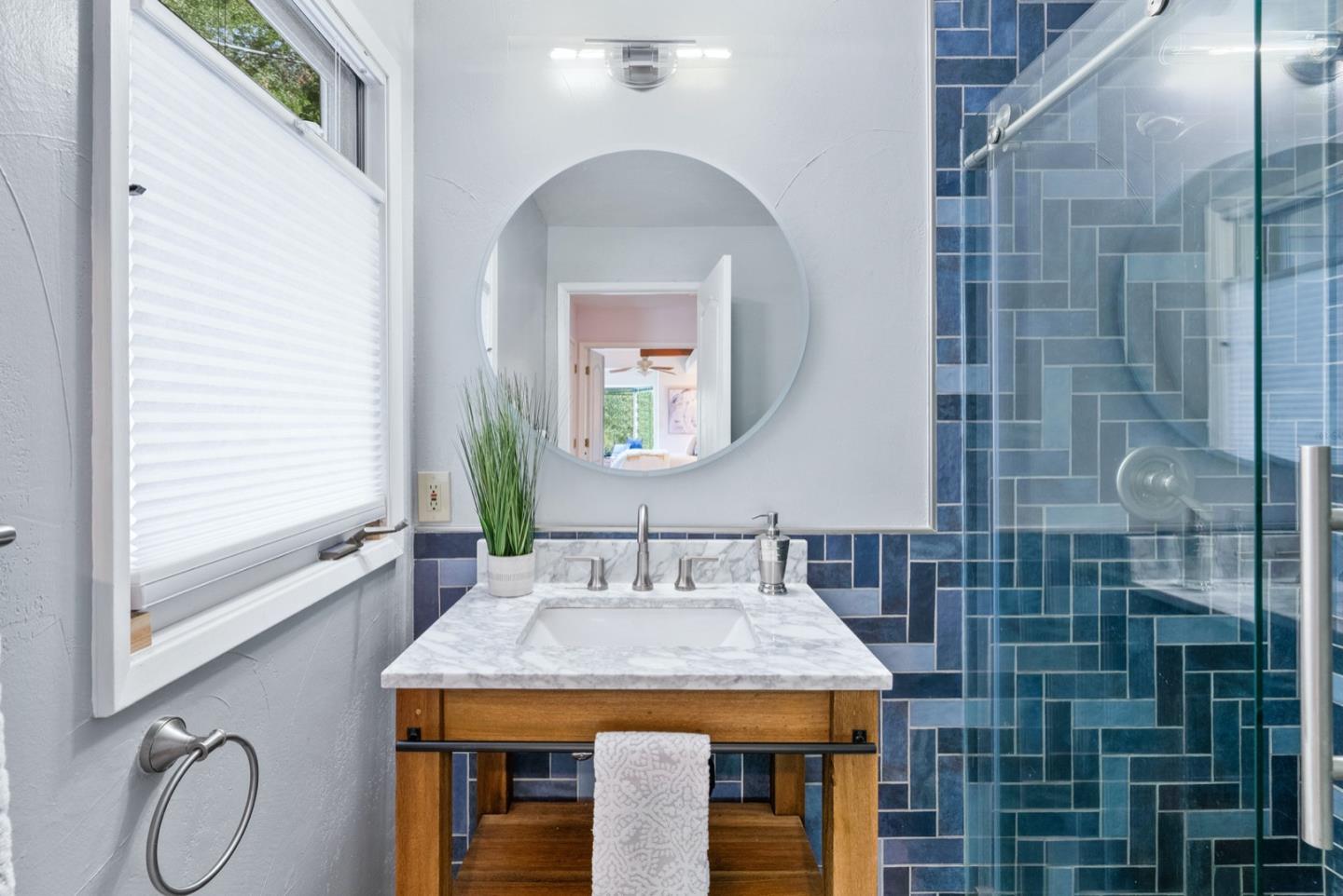 720 Fern Ridge Felton, CA 95018 - Photo 17 of 47 a bathroom with a sink and a mirror