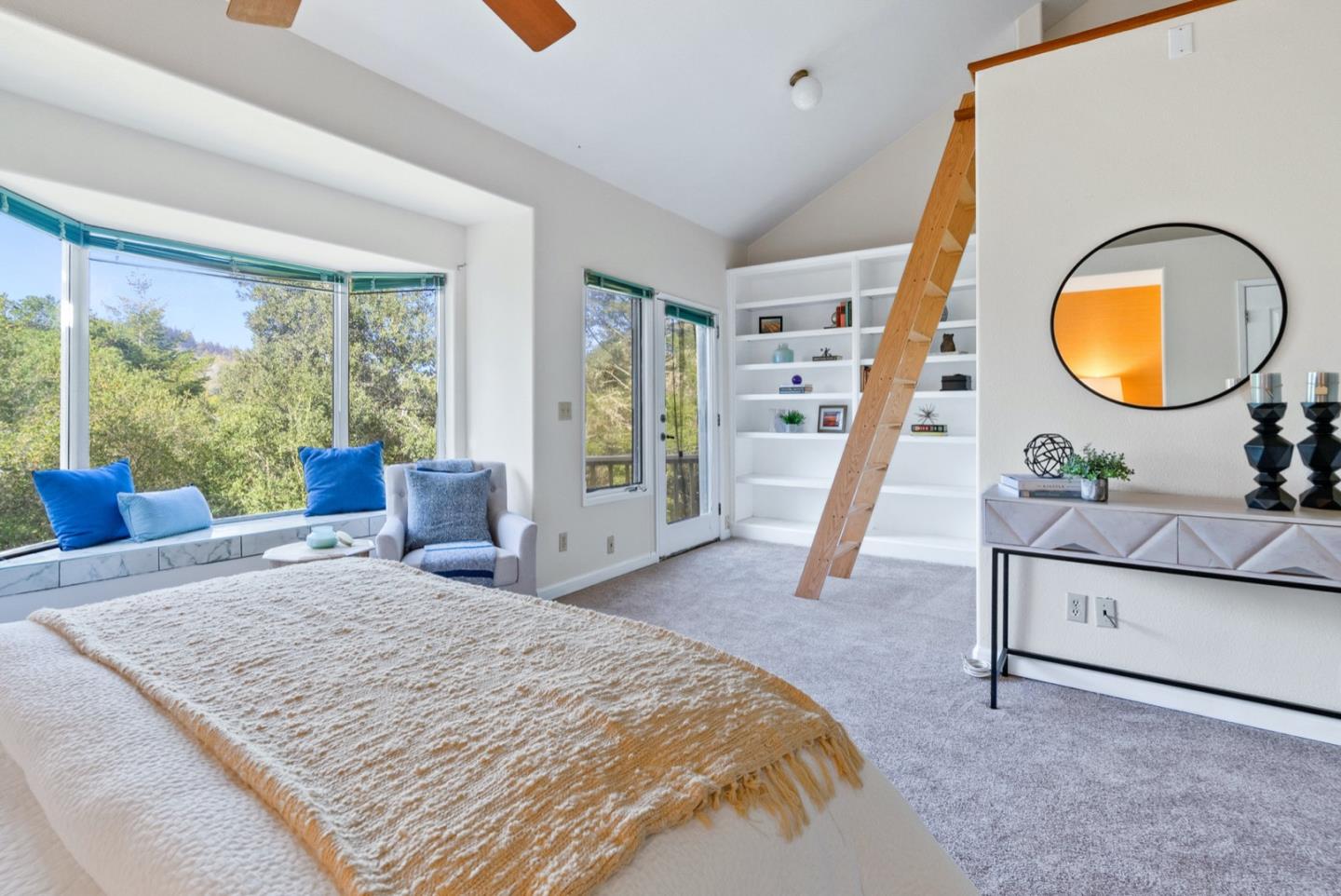 720 Fern Ridge Felton, CA 95018 - Photo 24 of 47 a spacious bedroom with a bed a table and large windows