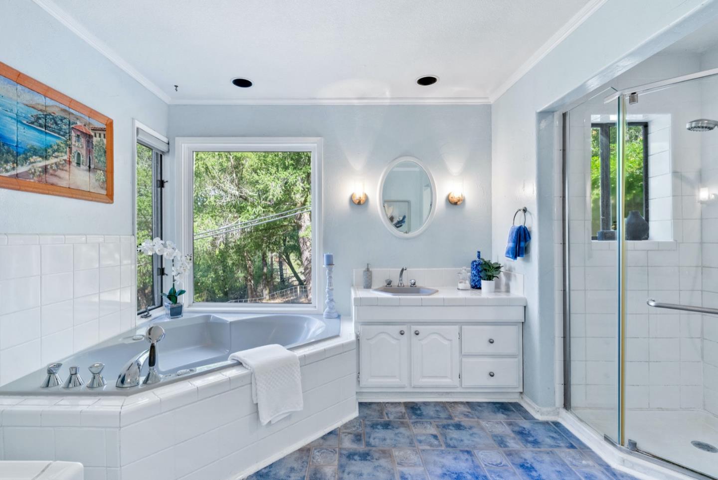 720 Fern Ridge Felton, CA 95018 - Photo 26 of 47 a bathroom with a tub a sink and a large mirror