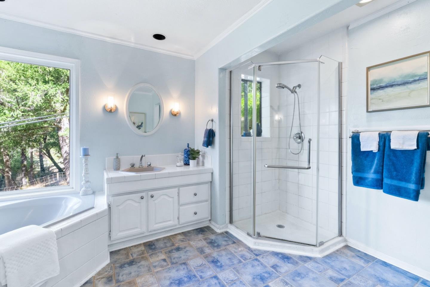 720 Fern Ridge Felton, CA 95018 - Photo 27 of 47 a bathroom with a tub a sink and mirrors