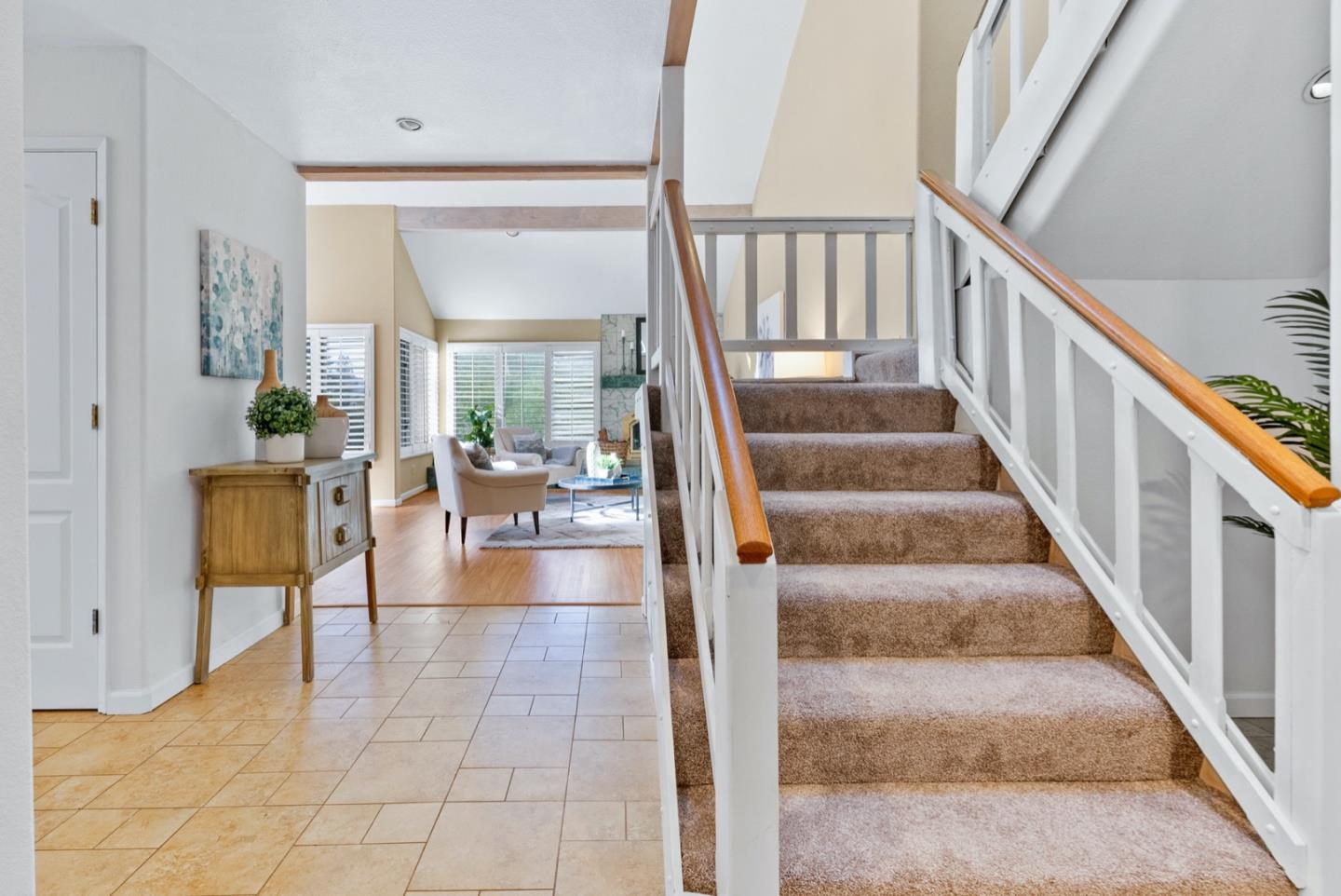 720 Fern Ridge Felton, CA 95018 - Photo 30 of 47 a view of staircase with lots of frames and a rug