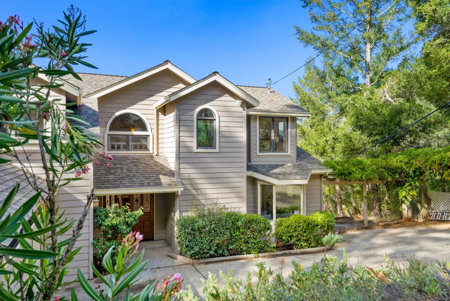 720 Fern Ridge Felton, CA 95018 - Photo 3 of 47 a front view of a house with garden