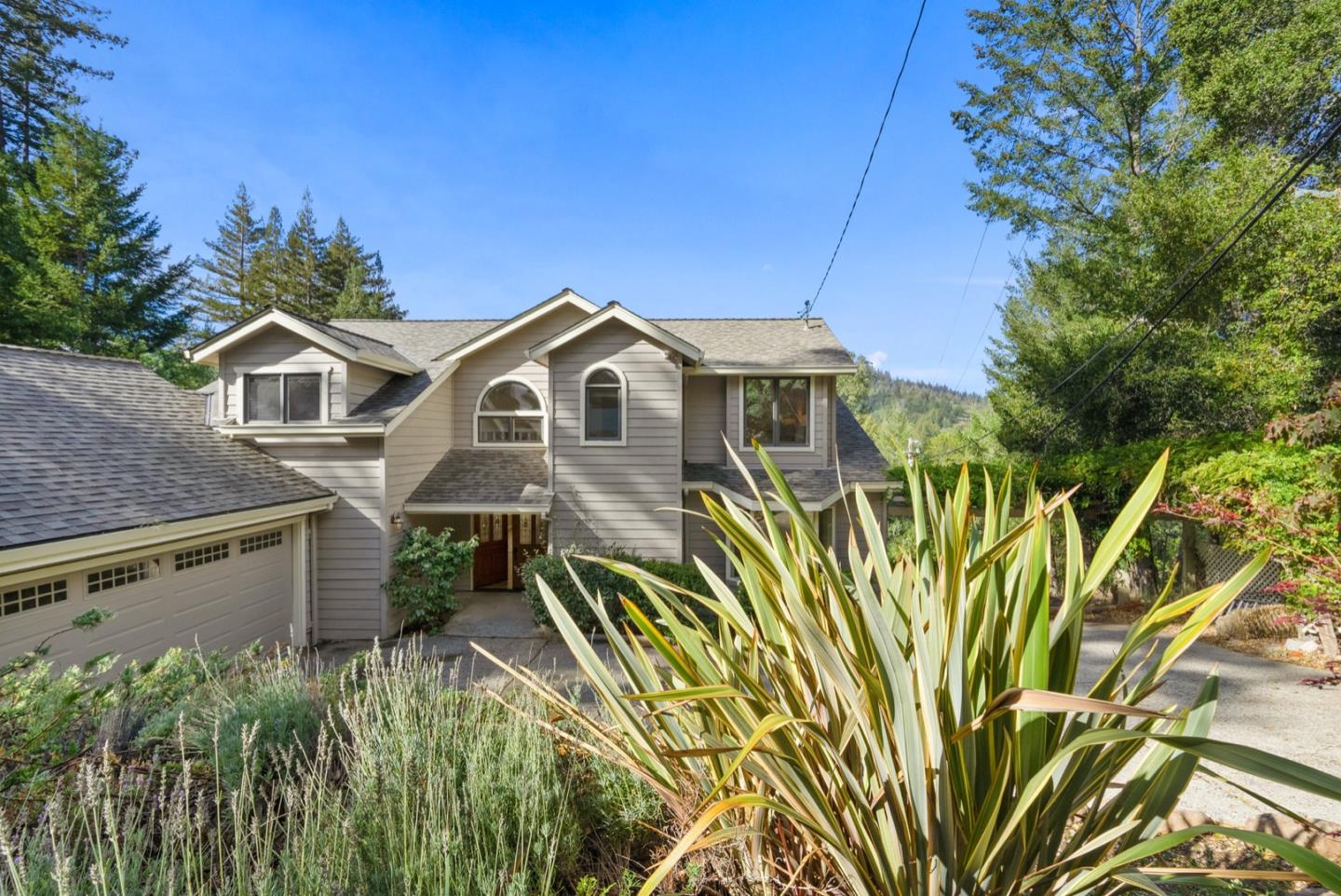 720 Fern Ridge Felton, CA 95018 - Photo 42 of 47 a front view of a house with a garden