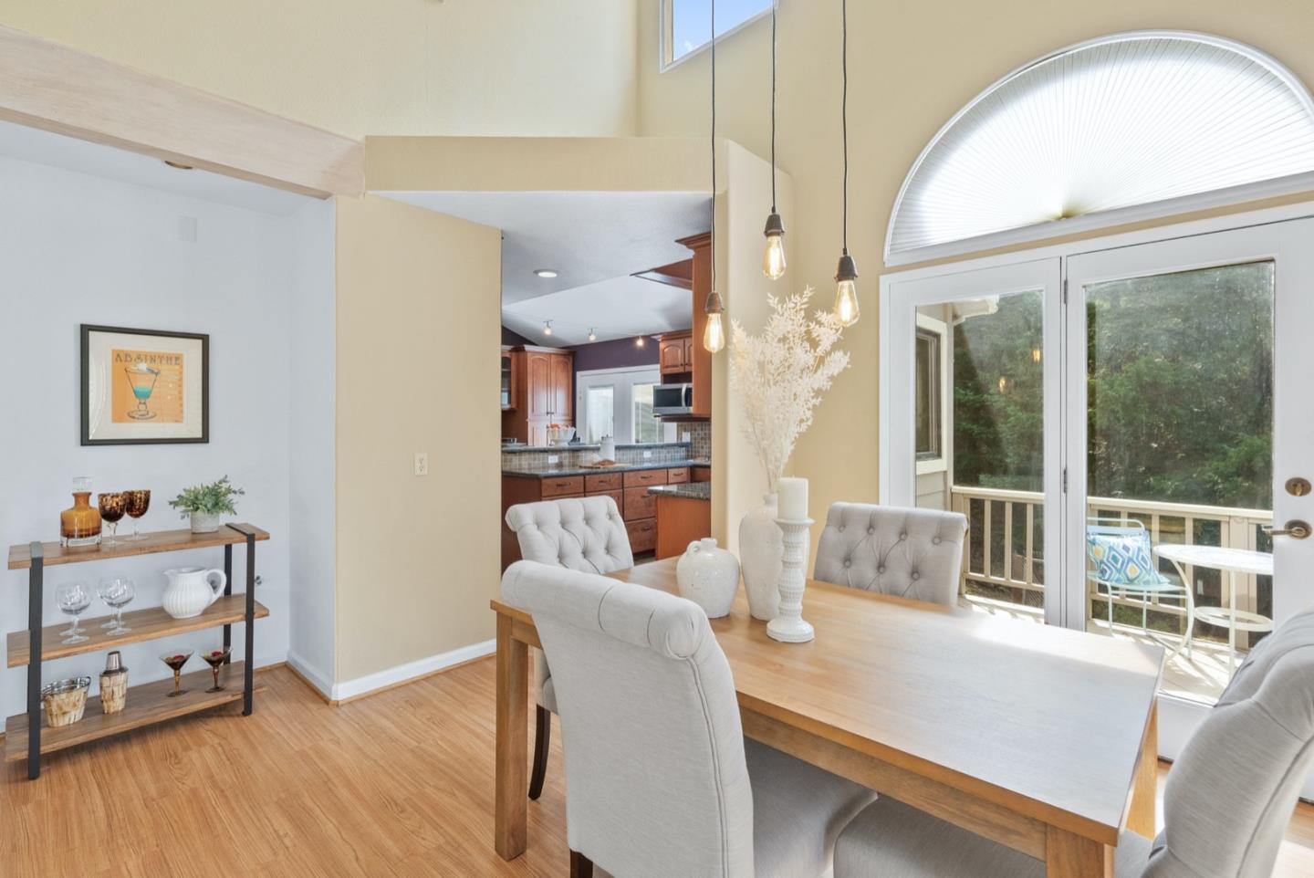 720 Fern Ridge Felton, CA 95018 - Photo 10 of 47 a dining room with furniture and a large window