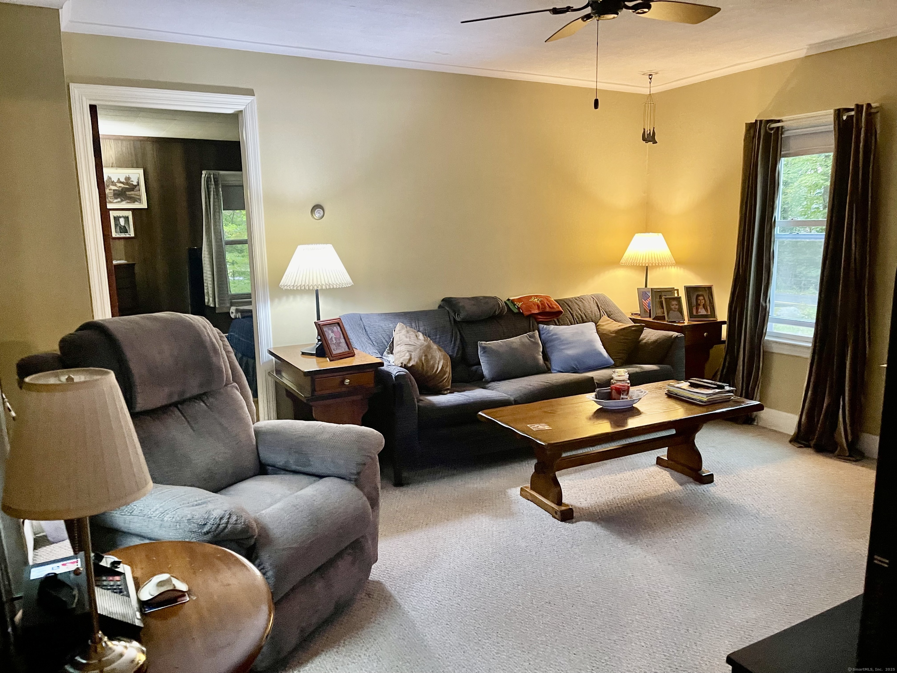66 Portland Avenue Redding, CT 06896 - Photo 6 of 24 Comfortable main level Living room with doorway to Bedroom
