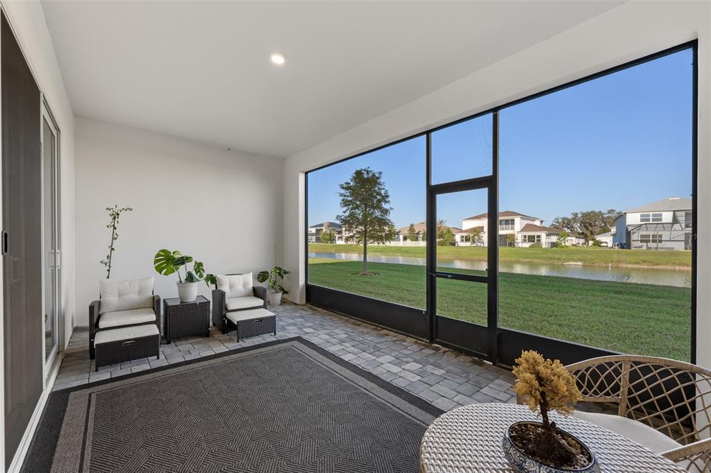 9185 Sanders Tree Loop Wesley Chapel, FL 33545 - Photo 34 of 47 a living room with furniture