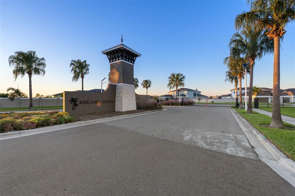 9185 Sanders Tree Loop Wesley Chapel, FL 33545 - Photo 40 of 47 a view of a street with a cars parked