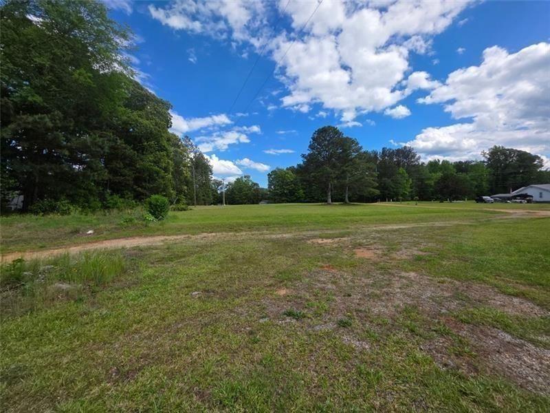 3834 Highway 124 Jefferson, GA 30549 - Photo 5 of 12 a view of a field with an trees