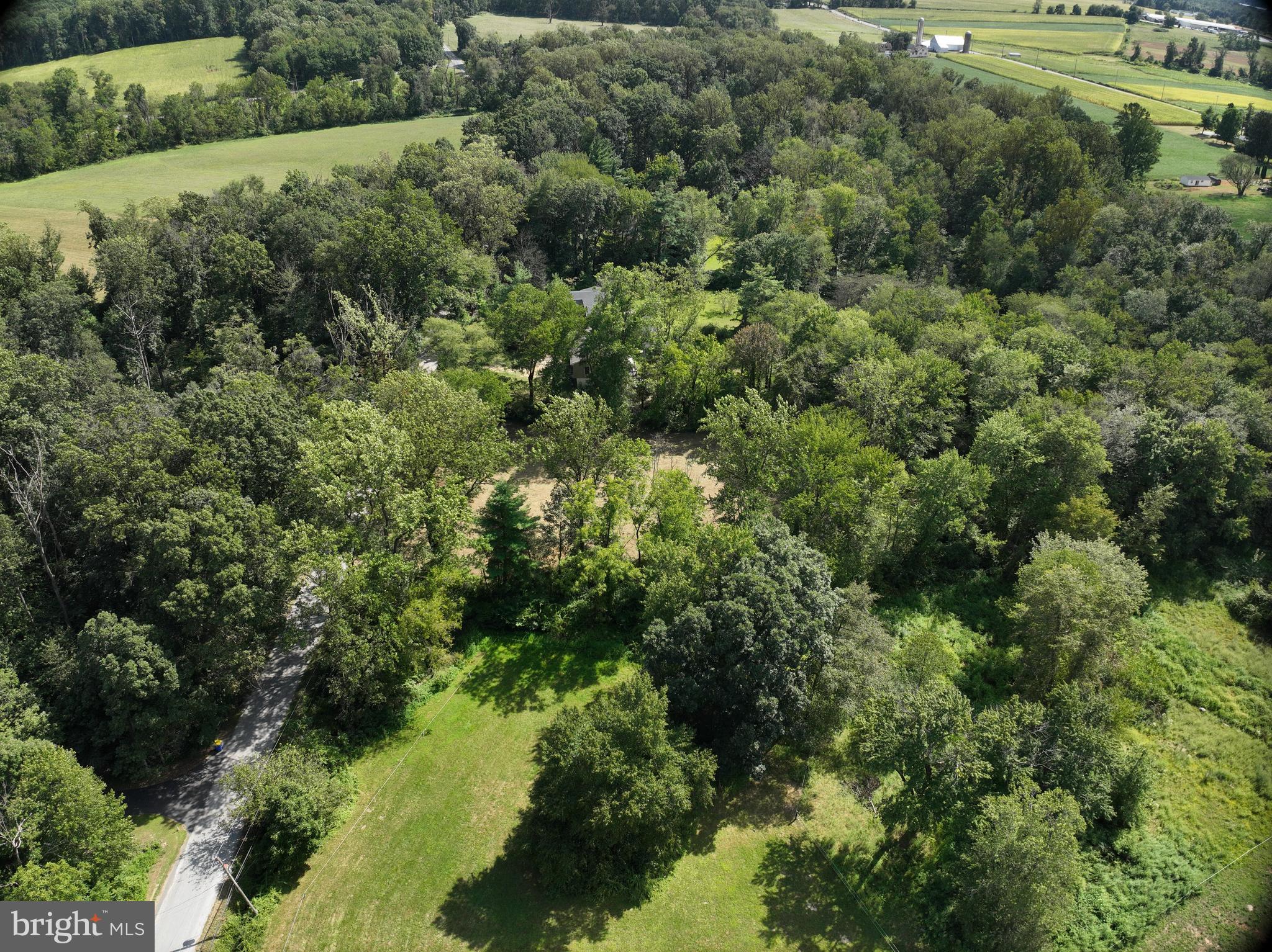 317 Compass Road Parkesburg, PA 19365 - Photo 13 of 23 an aerial view of residential house with outdoor space and trees all around