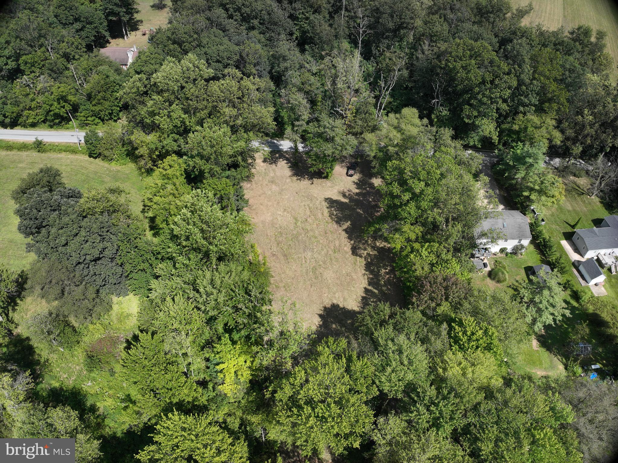 317 Compass Road Parkesburg, PA 19365 - Photo 9 of 23 an aerial view of residential house with outdoor space and trees all around