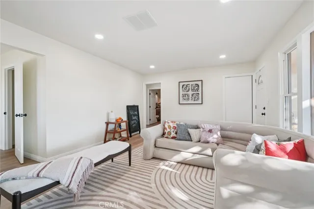 a living room with furniture and a couch