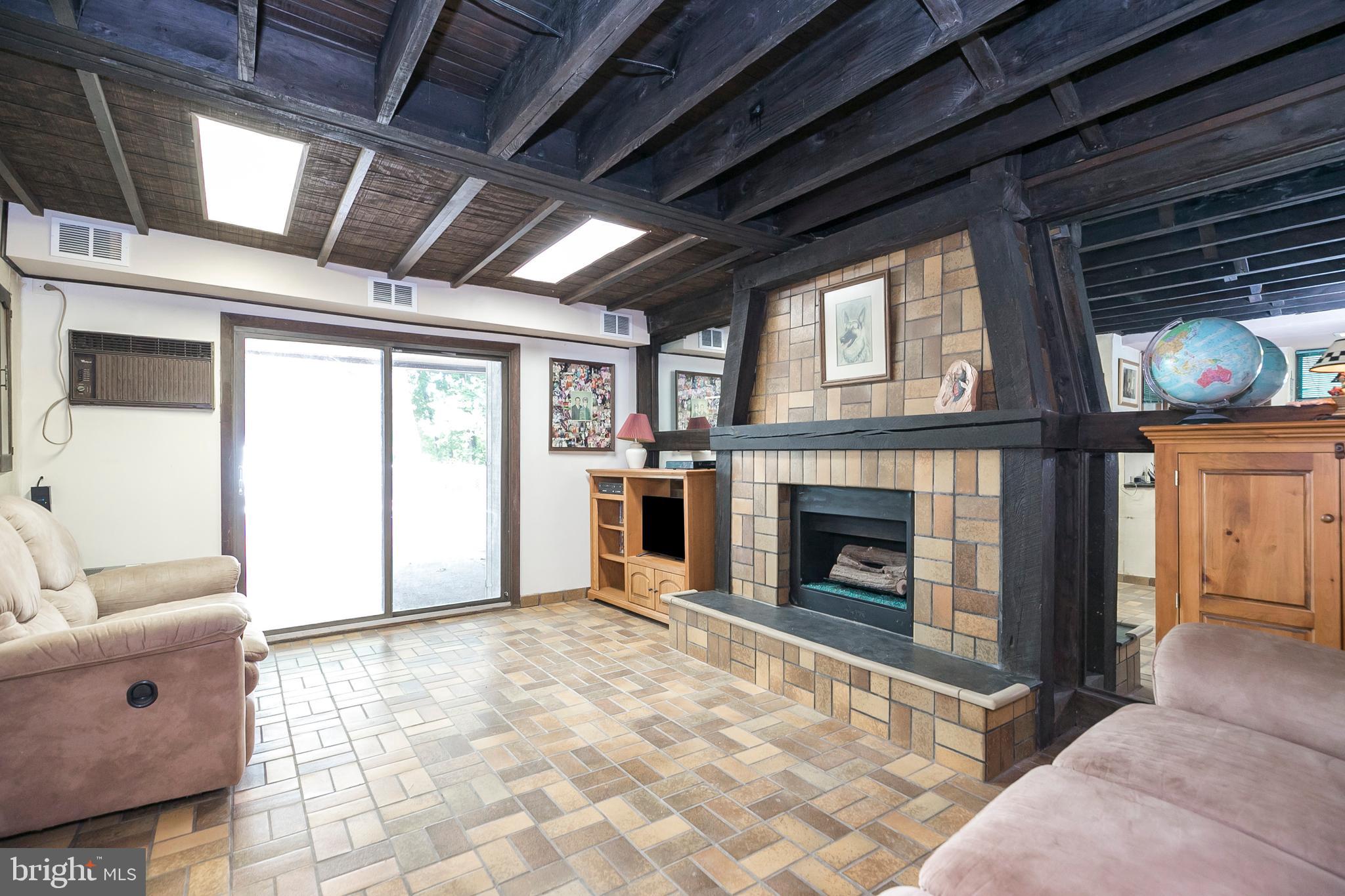 131 Walsh Road Lansdowne, PA 19050 - Photo 29 of 39 Finished Basement with Gas Fireplace