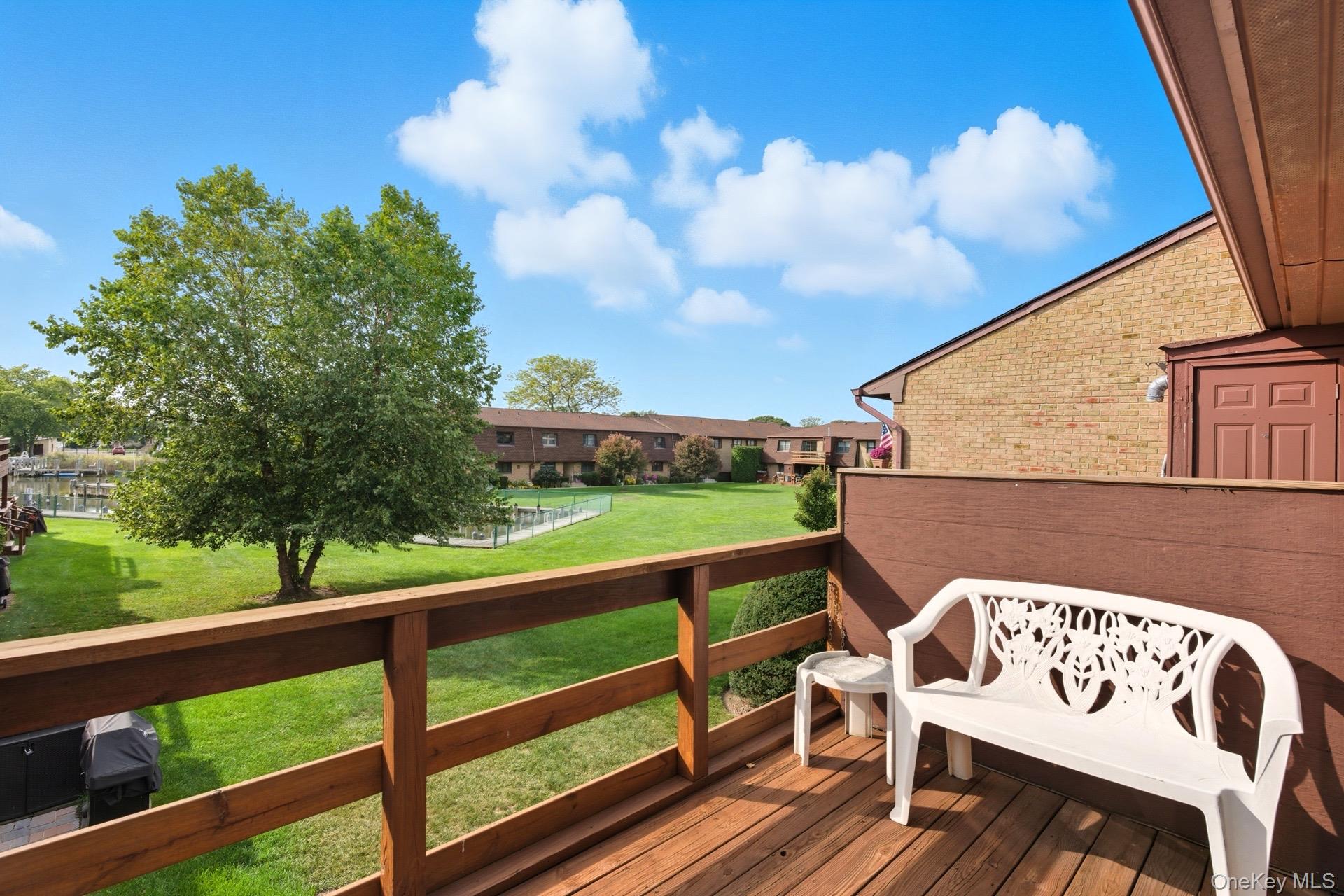 348 Mariners Way Copiague, NY 11726 - Photo 13 of 19 rear deck with lovely Water Views