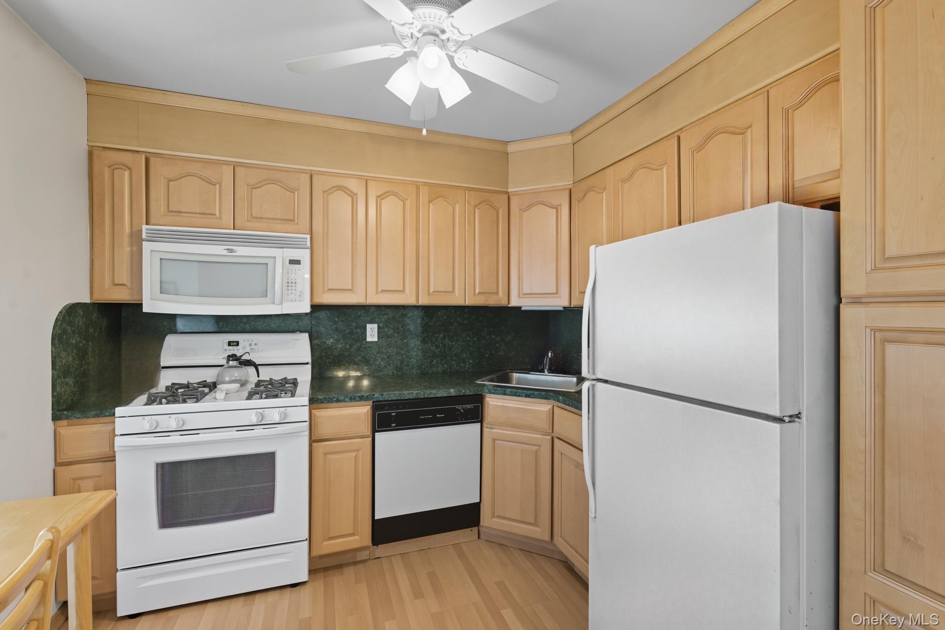348 Mariners Way Copiague, NY 11726 - Photo 8 of 19 Eat in Kitchen/Ga Cooking Included in Common Charges