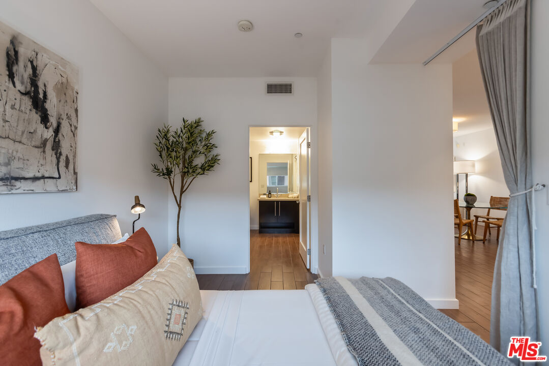 13045 Pacific Promenade, Unit 330 Los Angeles, CA 90094 - Photo 22 of 43 a living room with furniture and a fireplace
