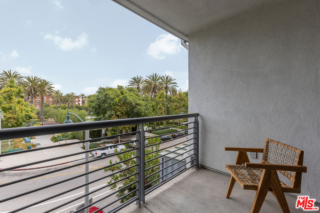 13045 Pacific Promenade, Unit 330 Los Angeles, CA 90094 - Photo 24 of 43 a view of a two chairs in the balcony