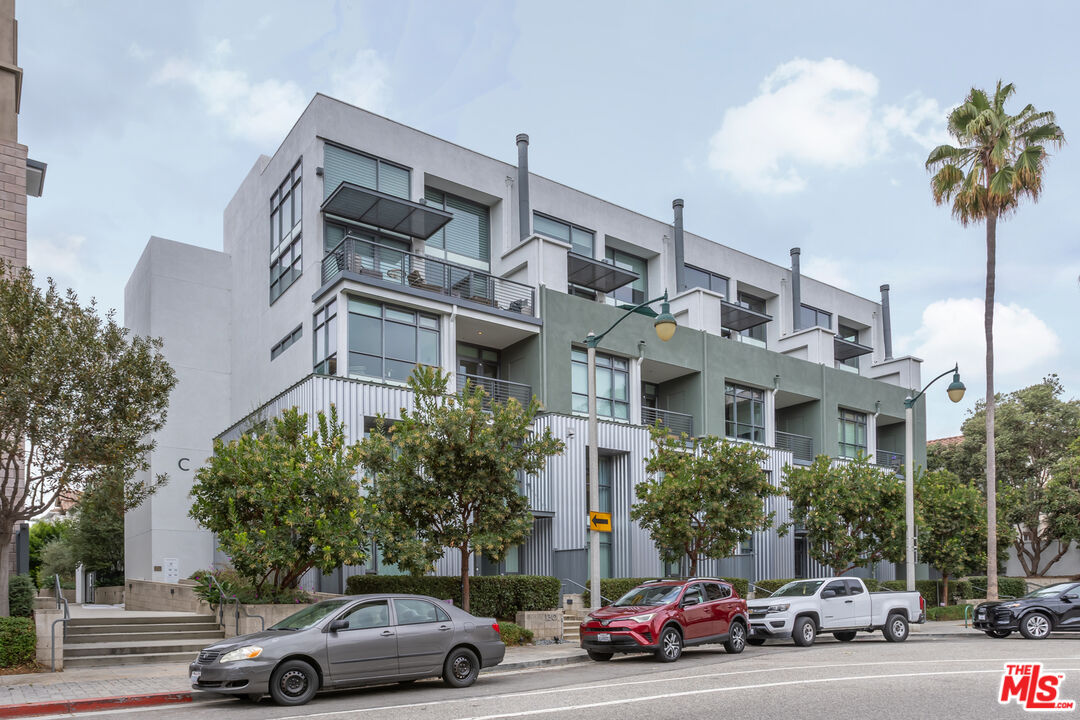 13045 Pacific Promenade, Unit 330 Los Angeles, CA 90094 - Photo 26 of 43 a front view of a building with trees