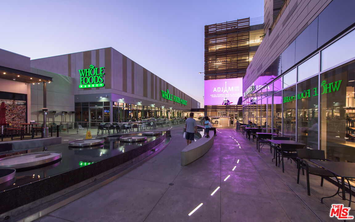 13045 Pacific Promenade, Unit 330 Los Angeles, CA 90094 - Photo 30 of 43 a view of a chairs and tables in a patio
