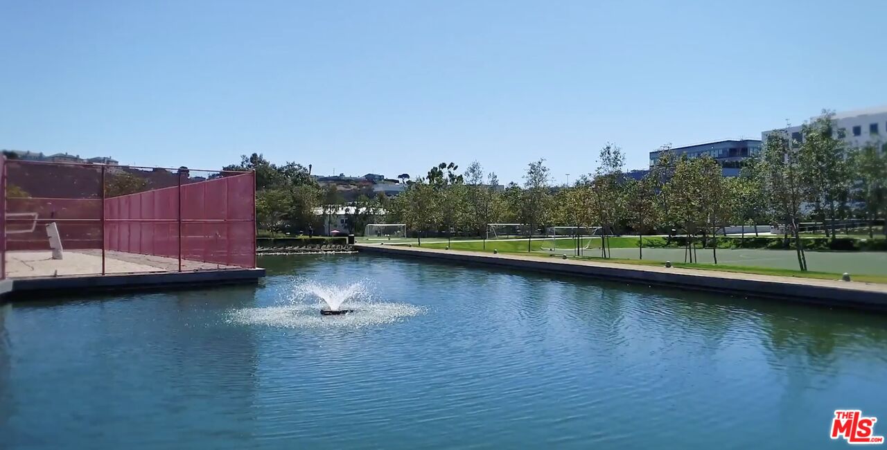 13045 Pacific Promenade, Unit 330 Los Angeles, CA 90094 - Photo 36 of 43 a view of a lake with a big yard