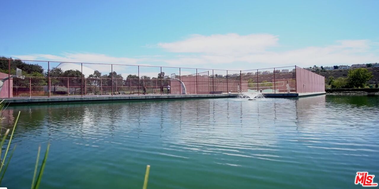 13045 Pacific Promenade, Unit 330 Los Angeles, CA 90094 - Photo 39 of 43 a view of a lake with houses