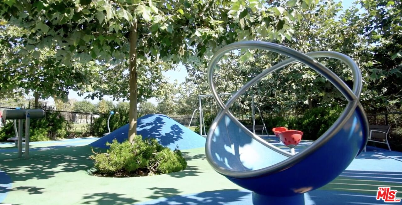 13045 Pacific Promenade, Unit 330 Los Angeles, CA 90094 - Photo 43 of 43 a view of a balcony with chairs and potted plants