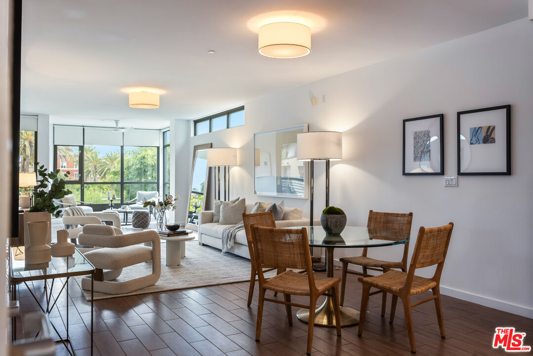 13045 Pacific Promenade, Unit 330 Los Angeles, CA 90094 - Photo 6 of 43 a dining room with furniture and wooden floor