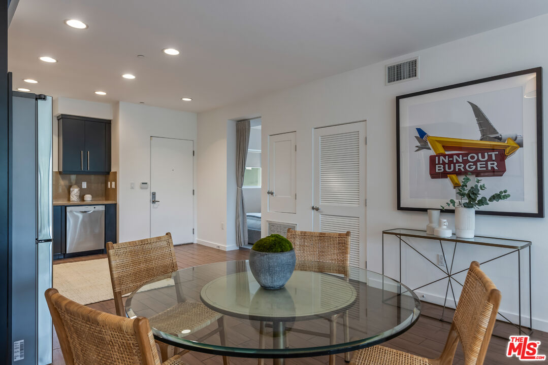 13045 Pacific Promenade, Unit 330 Los Angeles, CA 90094 - Photo 8 of 43 a view of a dining room with furniture
