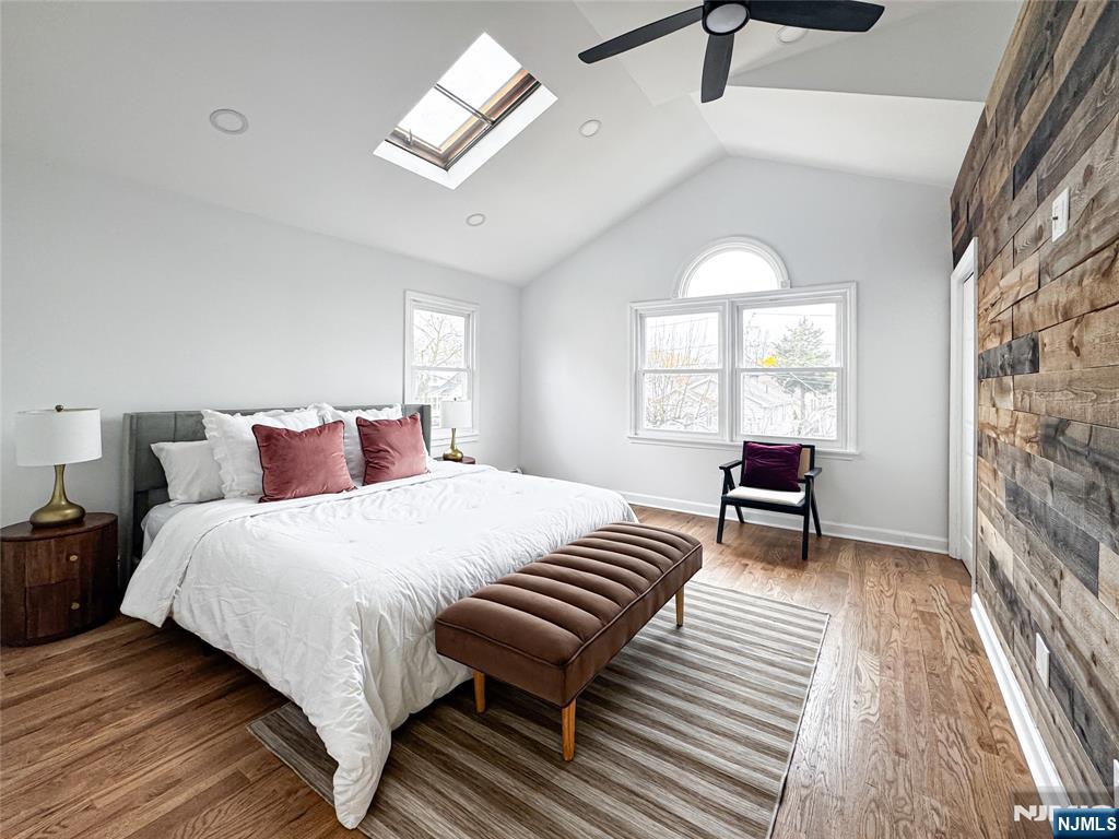 47 Elston Street Bloomfield, NJ 07003 - Photo 18 of 38 a bedroom with bed and a large window