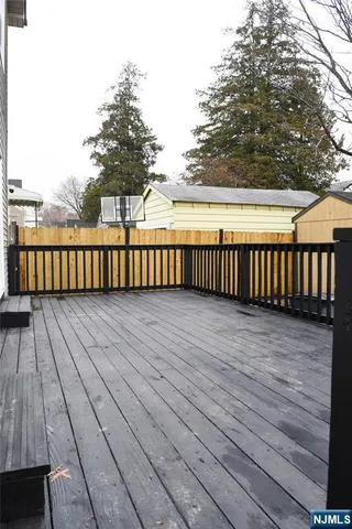 a terrace with wooden floor