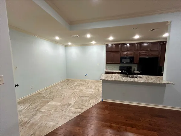 a view of a room with kitchen appliances