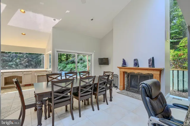a kitchen with granite countertop lots of counter top space and stainless steel appliances
