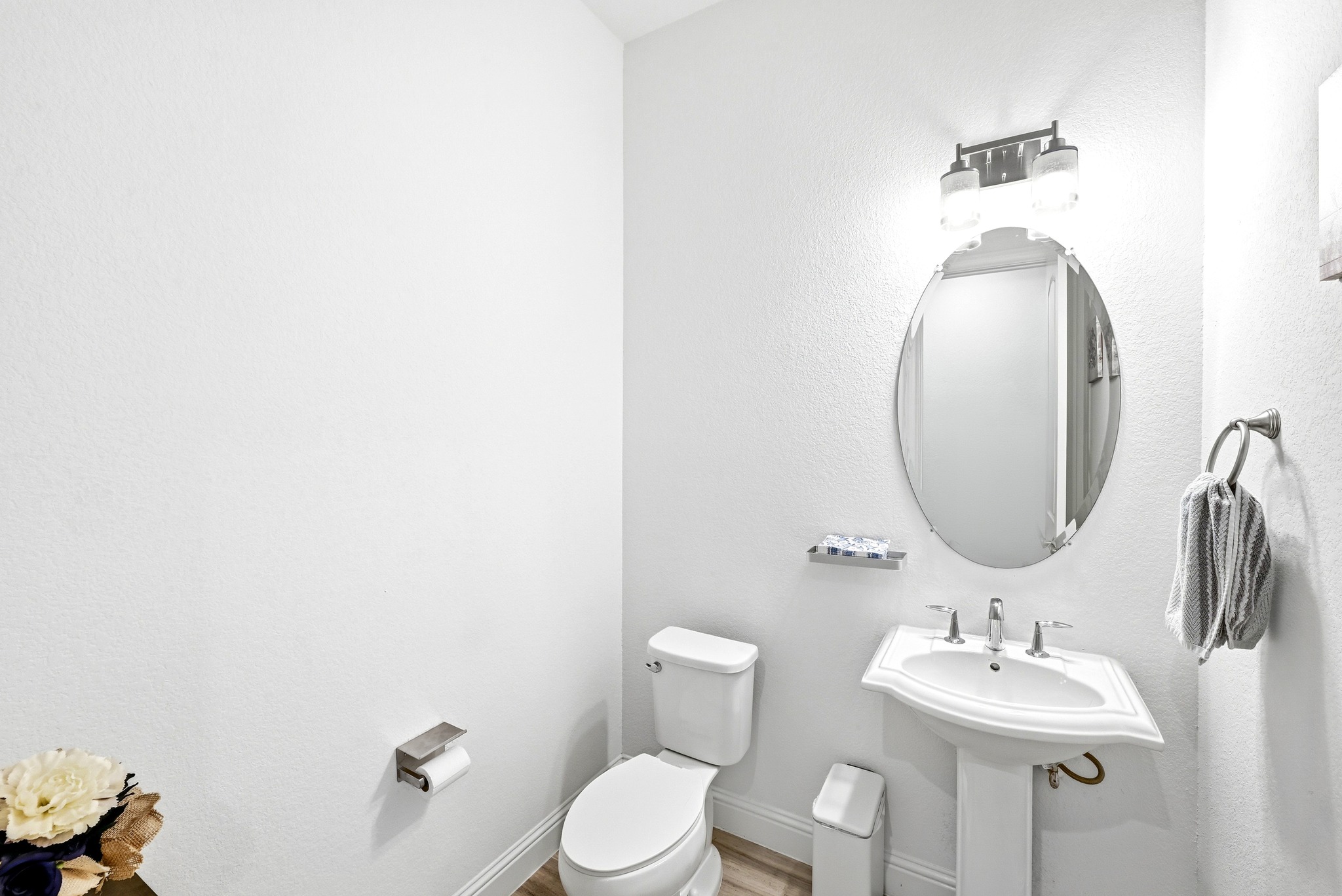 4601 Apollonia Way Leander, TX 78641 - Photo 36 of 40 a bathroom with a sink mirror and toilet