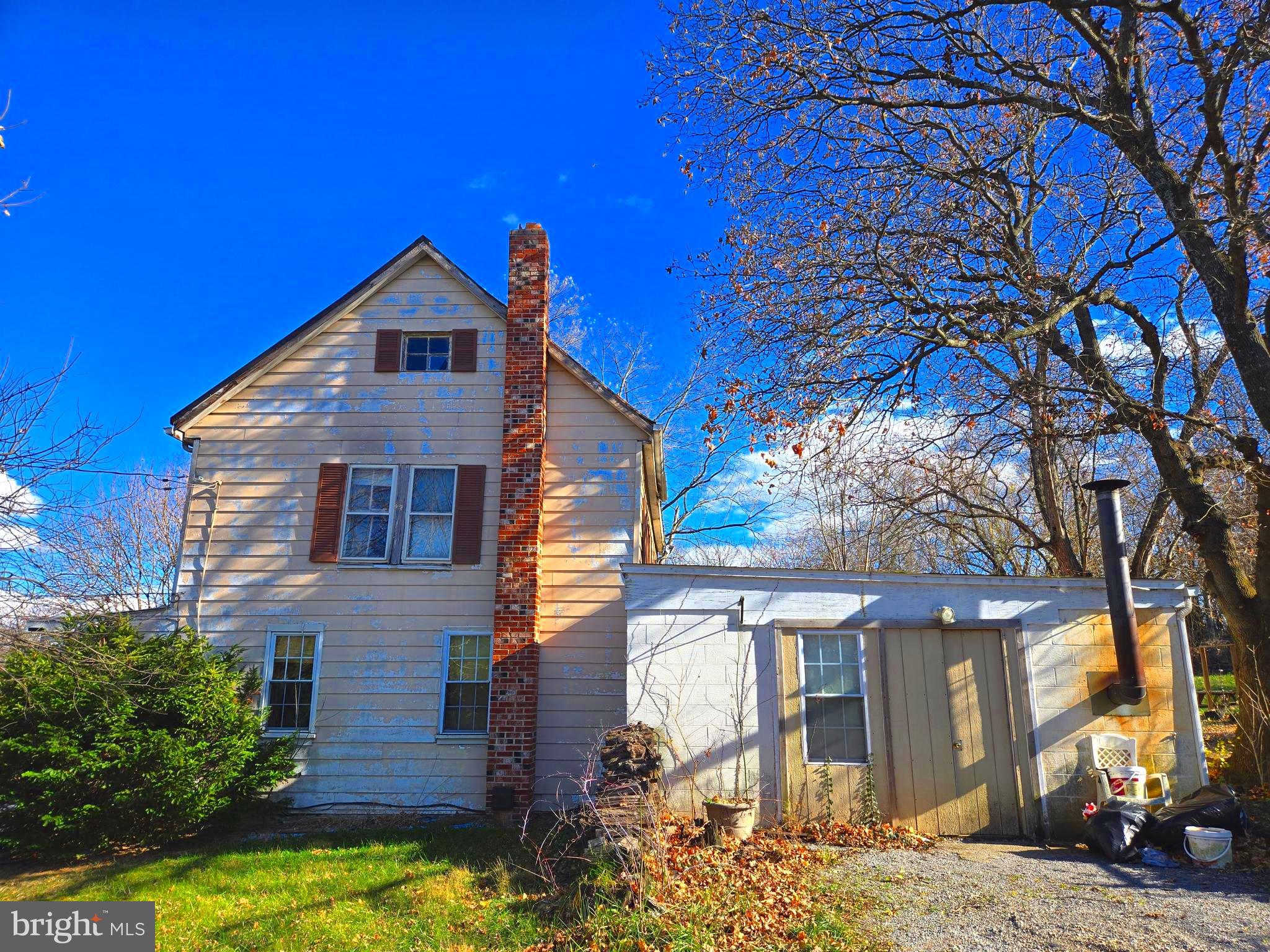196 Foster Drive Falling Waters, WV 25419 - Photo 12 of 50 a front view of a house with a yard