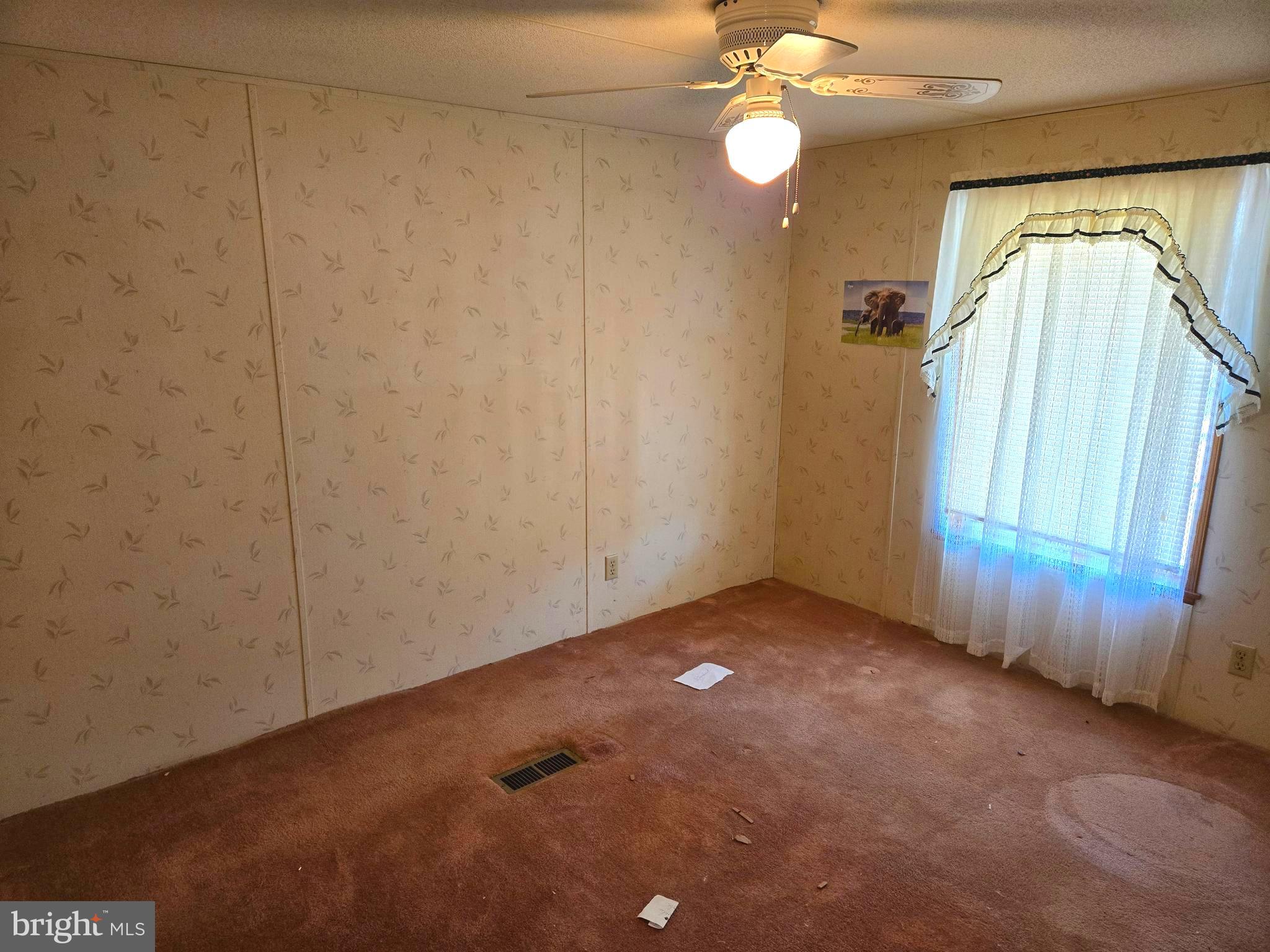 196 Foster Drive Falling Waters, WV 25419 - Photo 23 of 50 an empty room with windows and entrance
