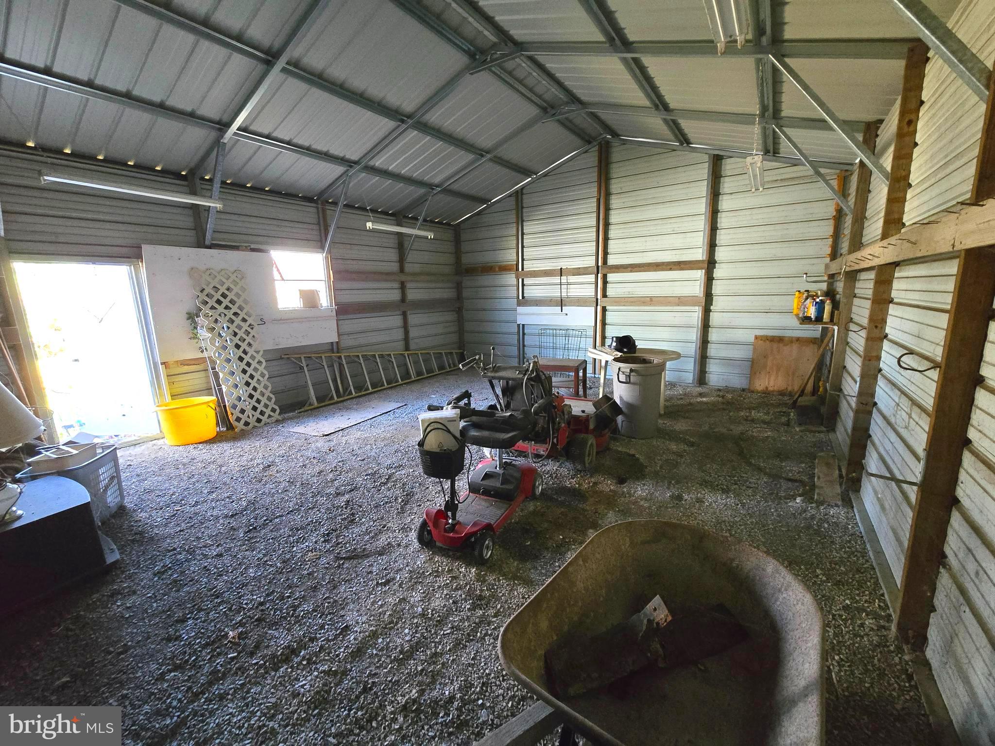 196 Foster Drive Falling Waters, WV 25419 - Photo 29 of 50 a bed room with a bed and a chair