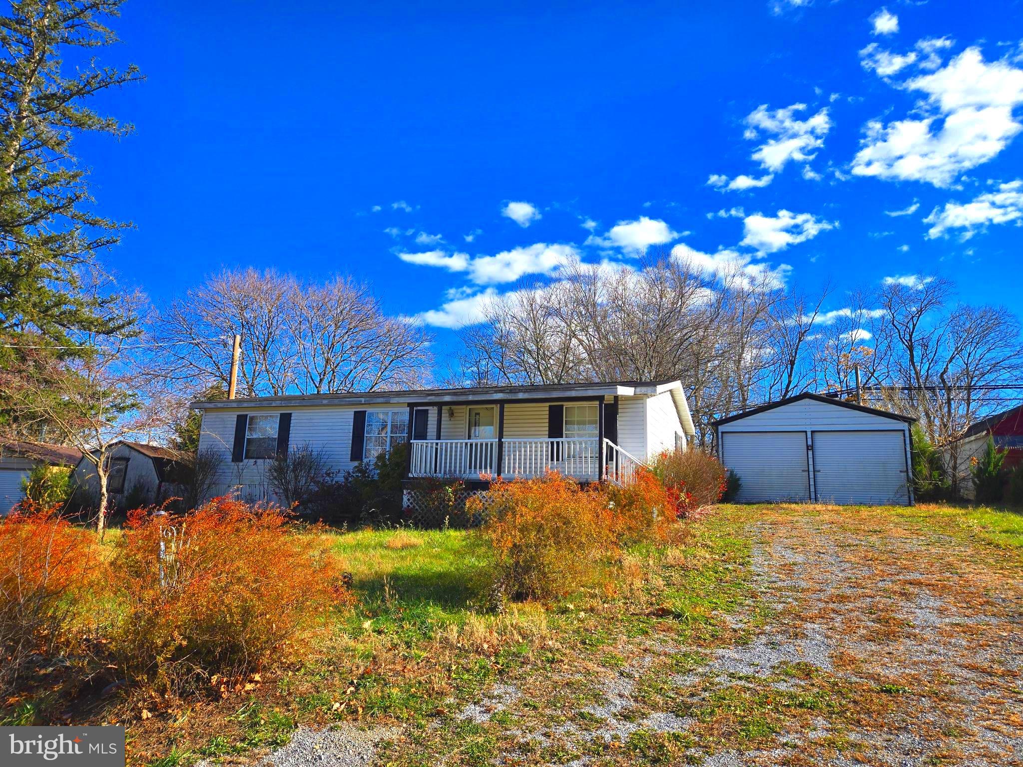 196 Foster Drive Falling Waters, WV 25419 - Photo 3 of 50 a view of a house with a yard
